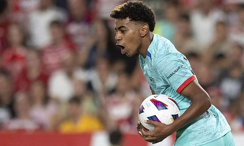 Lamine Yamal celebrates after scoring Barcelona’s first goal on Sunday