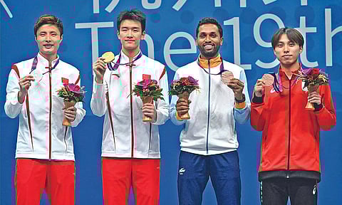 HS Prannoy with the bronze medal during the medal ceremony at Hangzhou