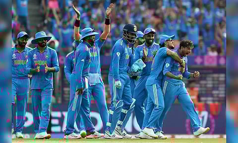 Team India players celebrating the seven-wicket win over Pakistan in the ODI World Cup match held at Narendra Modi Stadium in Ahmedabad.