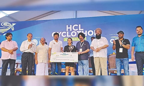 Khoirom Rejiya Devi collecting her prize.