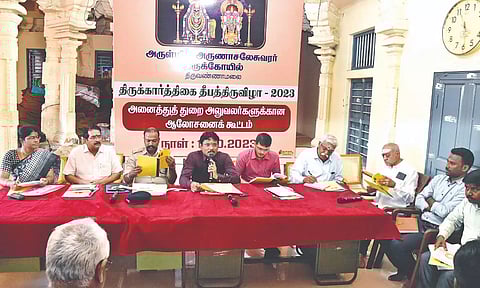 Collector B Murugesh presiding the meeting to review preparations for Karthigai Deepam festival in Tiruvannamalai on Wednesday.