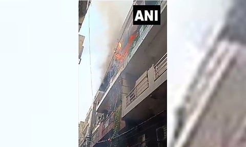 Fire breaks out in a residential building in North Delhi's Ghantaghar (ANI)