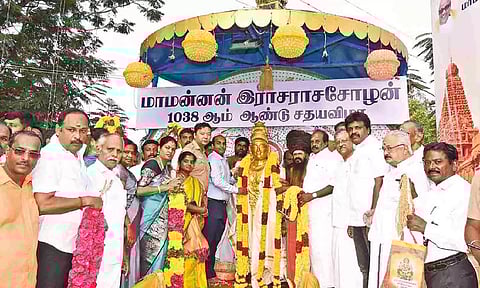Thanjavur Collector Deepak Jacob garlanding the statue of King Raja Raja Chola on Wednesday