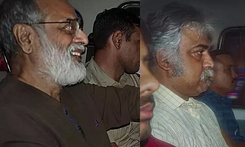 NewsClick editor-in-chief Prabir Purkayastha (left) and HR head Amit Chakravarty (PTI)