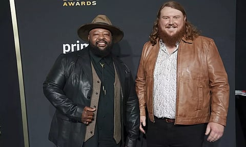 Leo Brooks (left) with Andrew Millsaps. (AP)