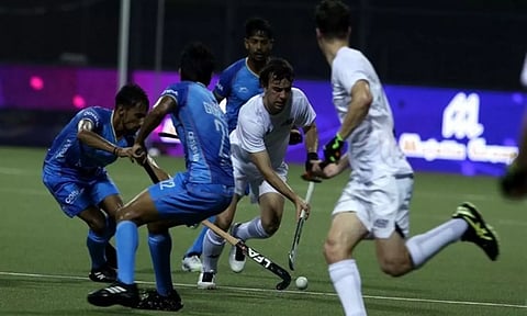 India and New Zealand players in action