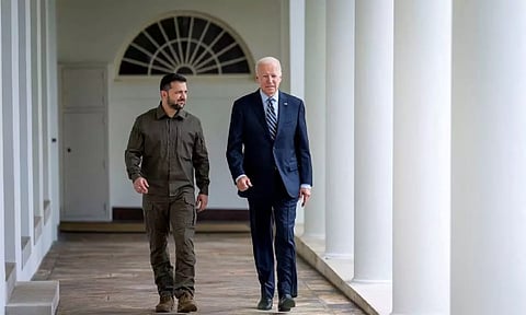 &nbsp;Ukrainian President Volodymyr Zelenskiy walks down the White House colonnade to the Oval Office with U.S. President Joe Biden (Reuters)&nbsp;