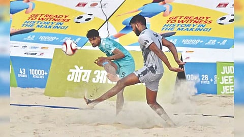 Kerala, Goa players vie for the ball at the beach football final