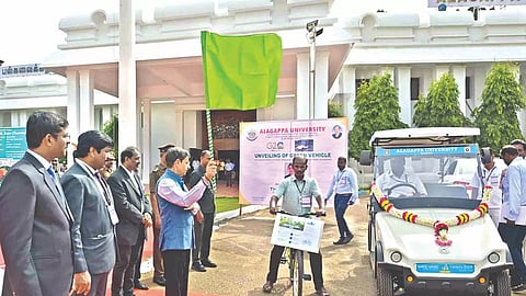 Governor RN Ravi and Chancellor of Alagappa University flag off green vehicles at the university in Karaikudi on Friday