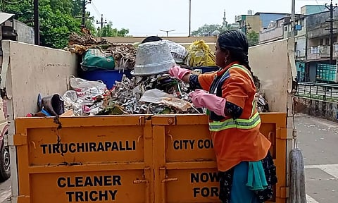 Conservancy workers involved in removal of garbage accumulated in the public places