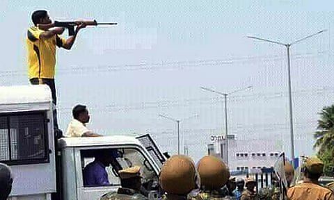 A policeman firing at anti-Sterlite protesters on May 22, 2018. (File)