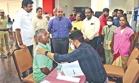 Cleanliness staff being checked at medical camp in Thanjavur