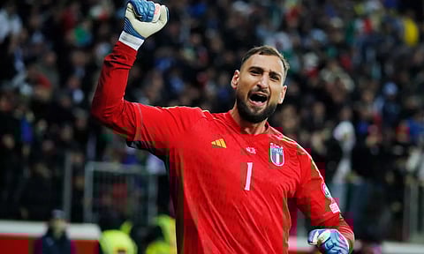 Italy's Gianluigi Donnarumma celebrates qualifying for Euro 2024 (Photo: Reuters)