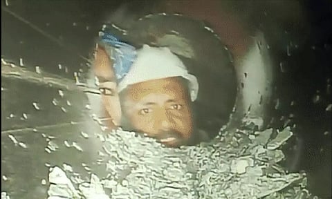 Trapped workers seen in camera through pipeline. (ANI)