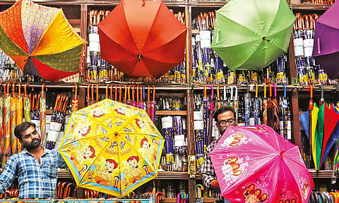 Umbrellas and raincoats are in demand now (Photo: Hemanathan.M)