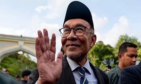 Malaysia's Prime Minister Anwar Ibrahim (X)