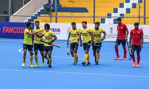 Haryana (L) players celebrate their goal against Tamil Nadu in the semi-final