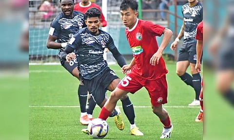 Shillong Lajong’s Pursunep in action against Churchill Brothers