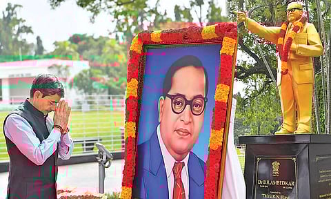 Governor RN Ravi paying floral tributes to a portrait of Dr Ambedkar at Raj Bhavan on Wednesday