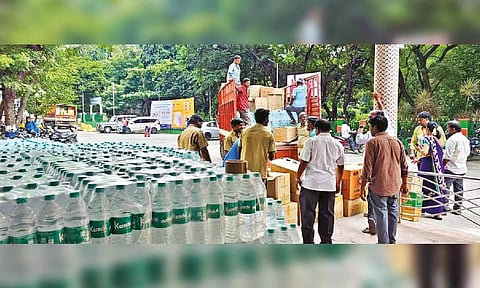 More relief materials stacked in front of Vellore Collectorate on Friday