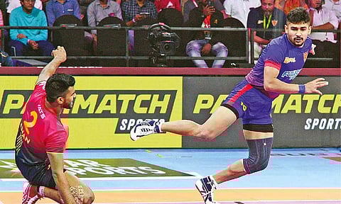 Dabang Delhi captain Naveen Kumar in action against Bengaluru