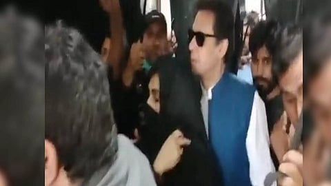 PTI Chief Imran Khan with his wife Bushra Bibi (Image: X/The Truth International)