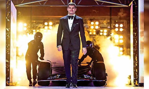 Max Verstappen gets introduced onstage at the FIA awards