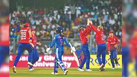 England celebrates the wicket of Smriti Mandhana