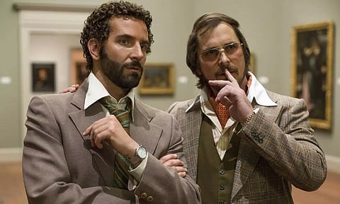 Christian Bale, Bradley Cooper in ‘American Hustle’
