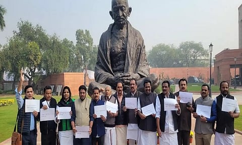 Kerala MPs hold protest in front of Gandhi statue in Parliament