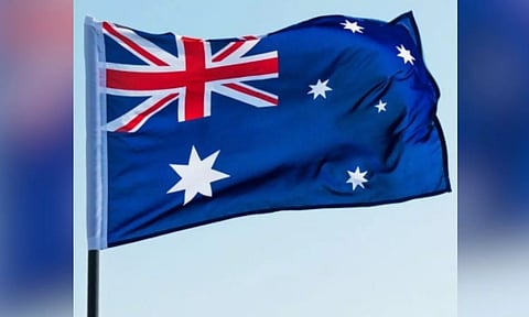 Higher tax earnings slash Australian budget deficit