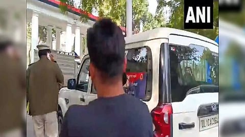 Two people, protesting with colour smoke outside Parliament, were taken to police station after arrest (Photo/ANI)