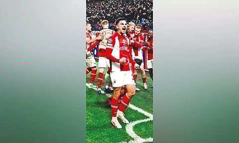 George Ilenikhena celebrates his late winner against Barcelona