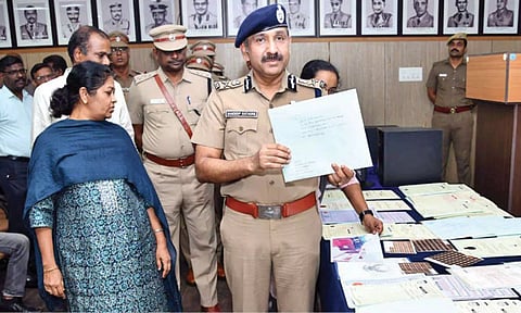 Commissioner Sandeep Rai Rathore with seized documents in Chennai on Saturday; (below) accused Mohammed Riyas