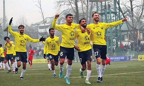 Real Kashmir players celebrate after their win