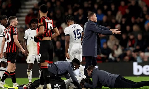 Tom Lockyer receives treatment on the pitch during the English Premier League soccer match between Bournemouth and Luton Town (Photo: AP)&nbsp;