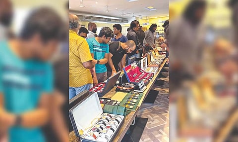 Members taking a look at the watch collection in this month’s meet-up. (Photo credit: Special Arrangement)