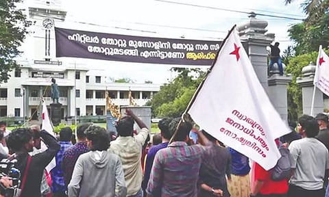 SFI staged black flag protest march outside Calicut Univ.