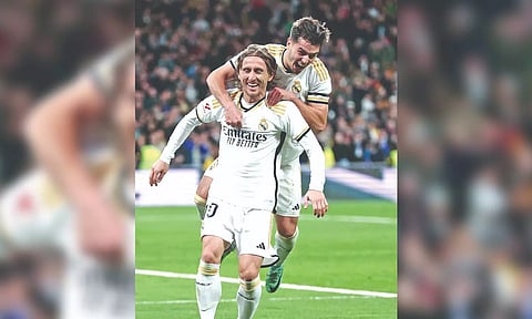Goalscorers Luka Modric and Brahim Diaz celebrate Madrid’s fourth goal of the match.
