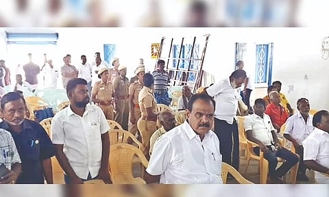 Quarry owners leave public hearing venue after facing opposition in Karur on Tuesday.