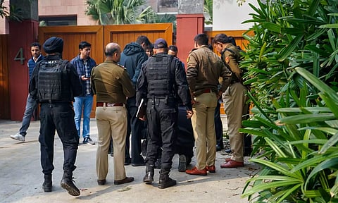 NSG Commandos with Police personnel and others during an investigation near the Israel Embassy after a reported low intensity blast nearby, in New Delhi, (PTI)