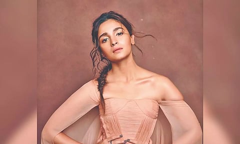 Alia Bhatt in peach colour dress