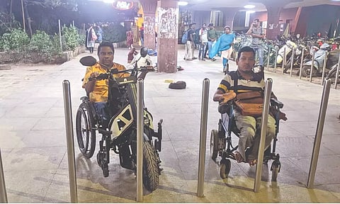 Bollards placed at the entrance of the Metro station prevent access for wheelchair users