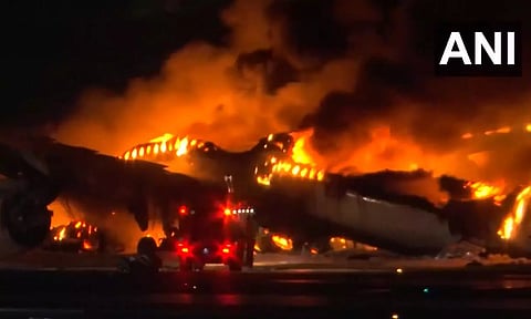 A plane burst into flames on the runway of Tokyo's Haneda airport (ANI)