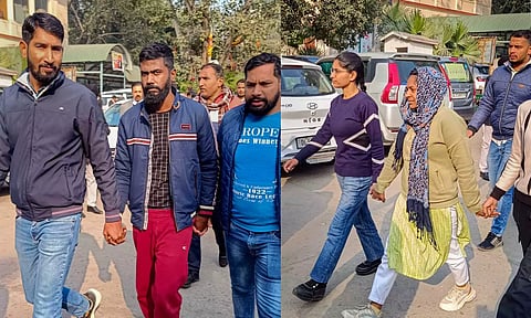 Neelam Azad and Manoranjan D, two accused arrested in the Parliament security breach case, being produced at the Patiala House court, in New DelhI, on Tuesday. (PTI)