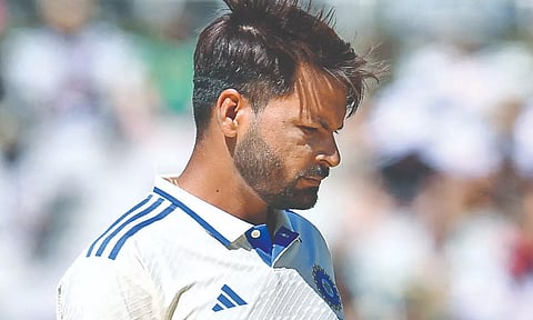 Mukesh Kumar prepares to deliver a ball