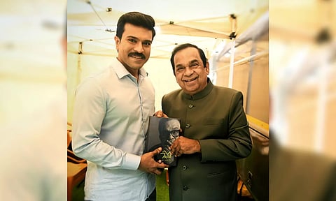 Ram Charan with Brahmanandam. (X)
