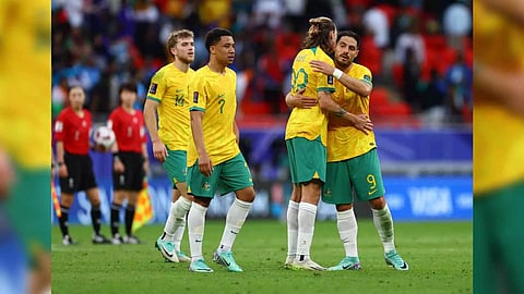 &nbsp;Australia's Bruno Fornaroli and Jackson Irvine celebrate after the match (Photo/Reuters)