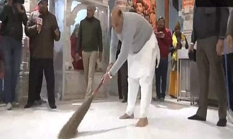 Rajnath Singh sweeping Hanuman Setu temple premises (ANI)
