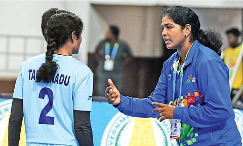 Kavitha Selvaraj (right) speaks to a Tamil Nadu player during the match against Haryana